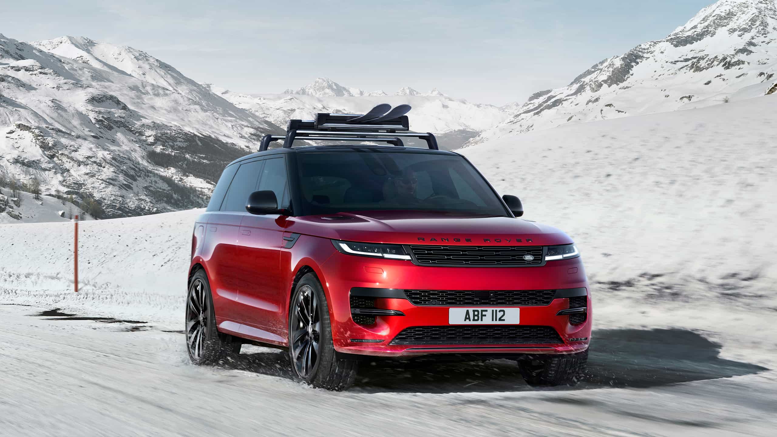 Range Rover Sport is Driving on Over Icy Mountain