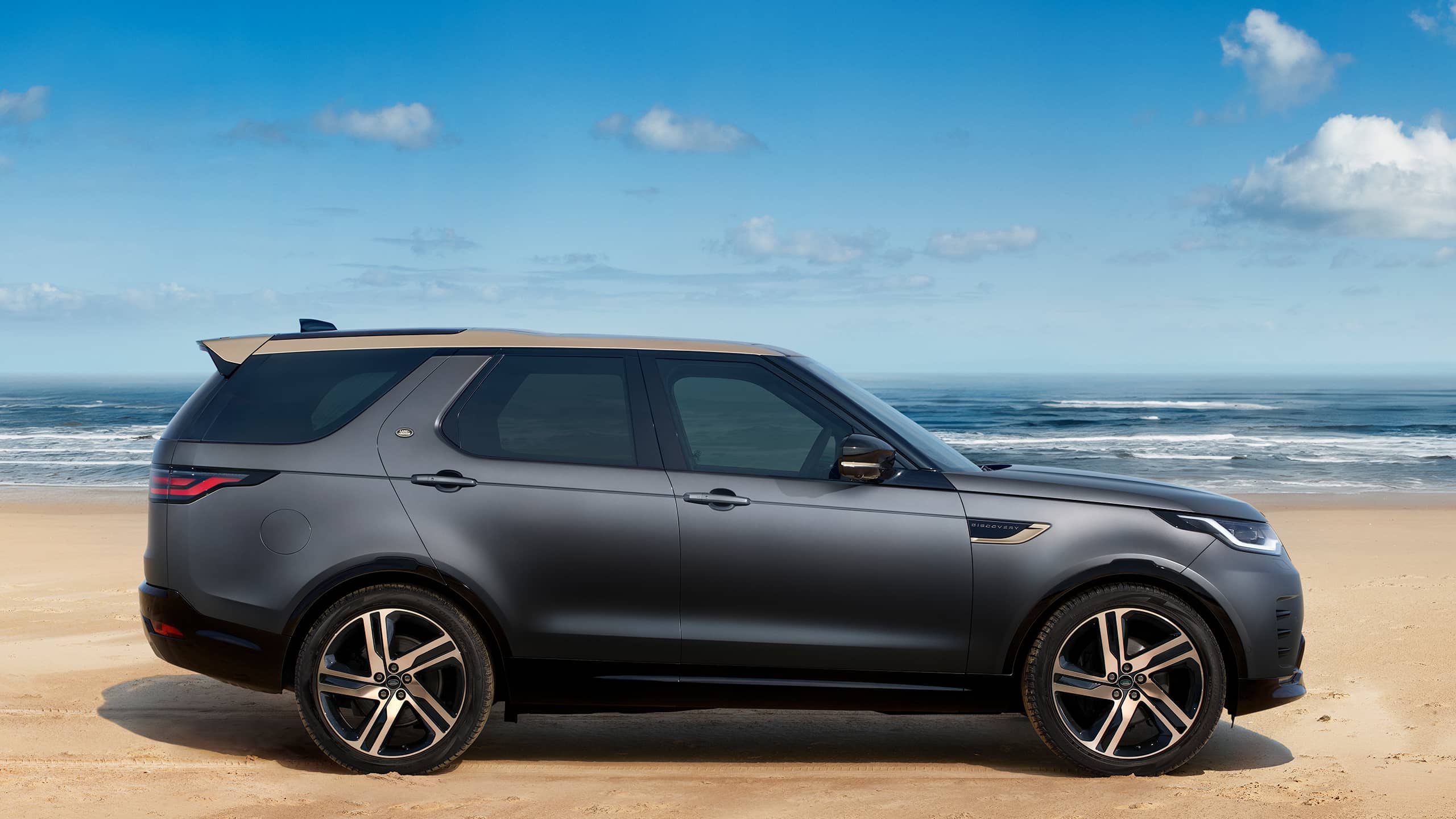 Discovery parked near seashore