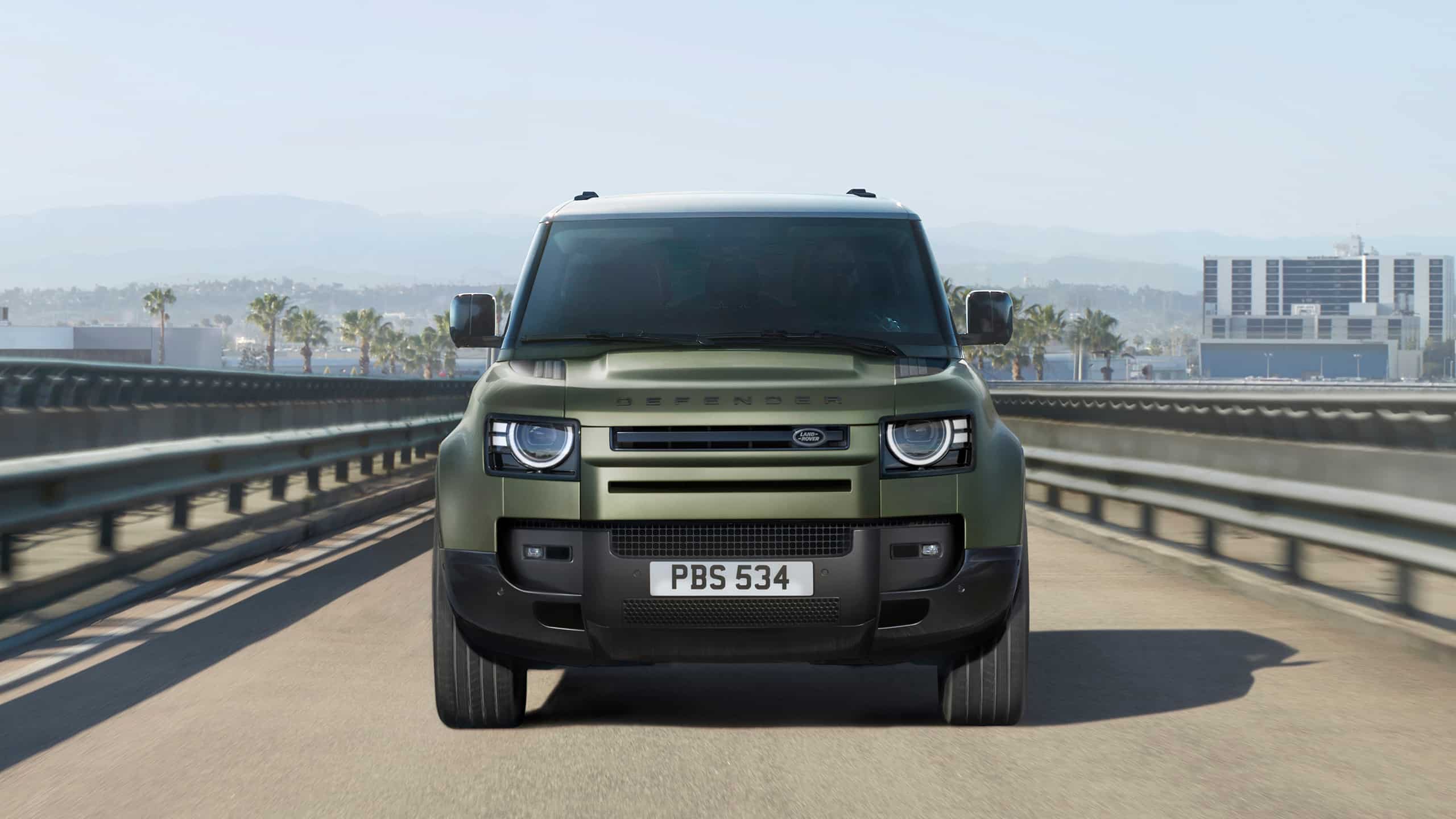 Defender driving on bridge